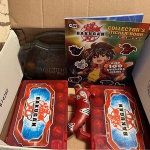 BAKUGAN Collection — Bakugan (3) cases, book, stickers, gadget, cards, and toys